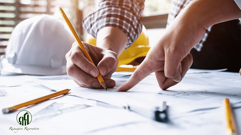 A contractor and a homeowner discussing a project